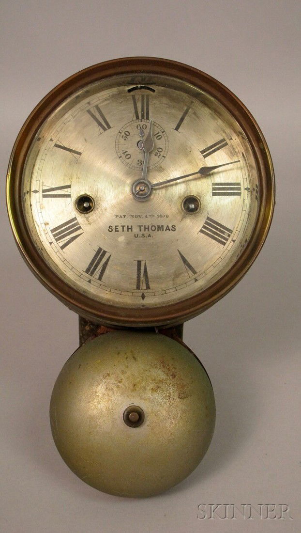Seth Thomas Ships Bell Clock, Thomaston, Connectic: Seth Thomas Ships Bell Clock, Thomaston, Connecticut, c. 1870, the zinc case with bayonet fit bezel over the 5 3/4 in. dia. silvered dial with Roman numerals, seconds bit and marked Seth Thomas, U.S.A