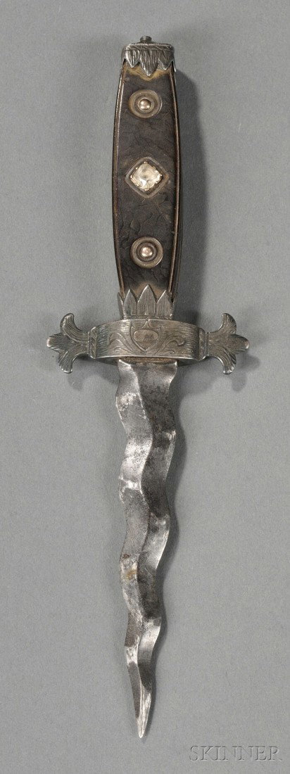 An Early "Wavy Blade" Dirk, probably 18th century,: An Early "Wavy Blade" Dirk, probably 18th century, with 4-in. steel blade, engraved fleur-de-lis guard, tortoiseshell handle with paste stone and engraved sides reading Draw Me Not Without Reason and