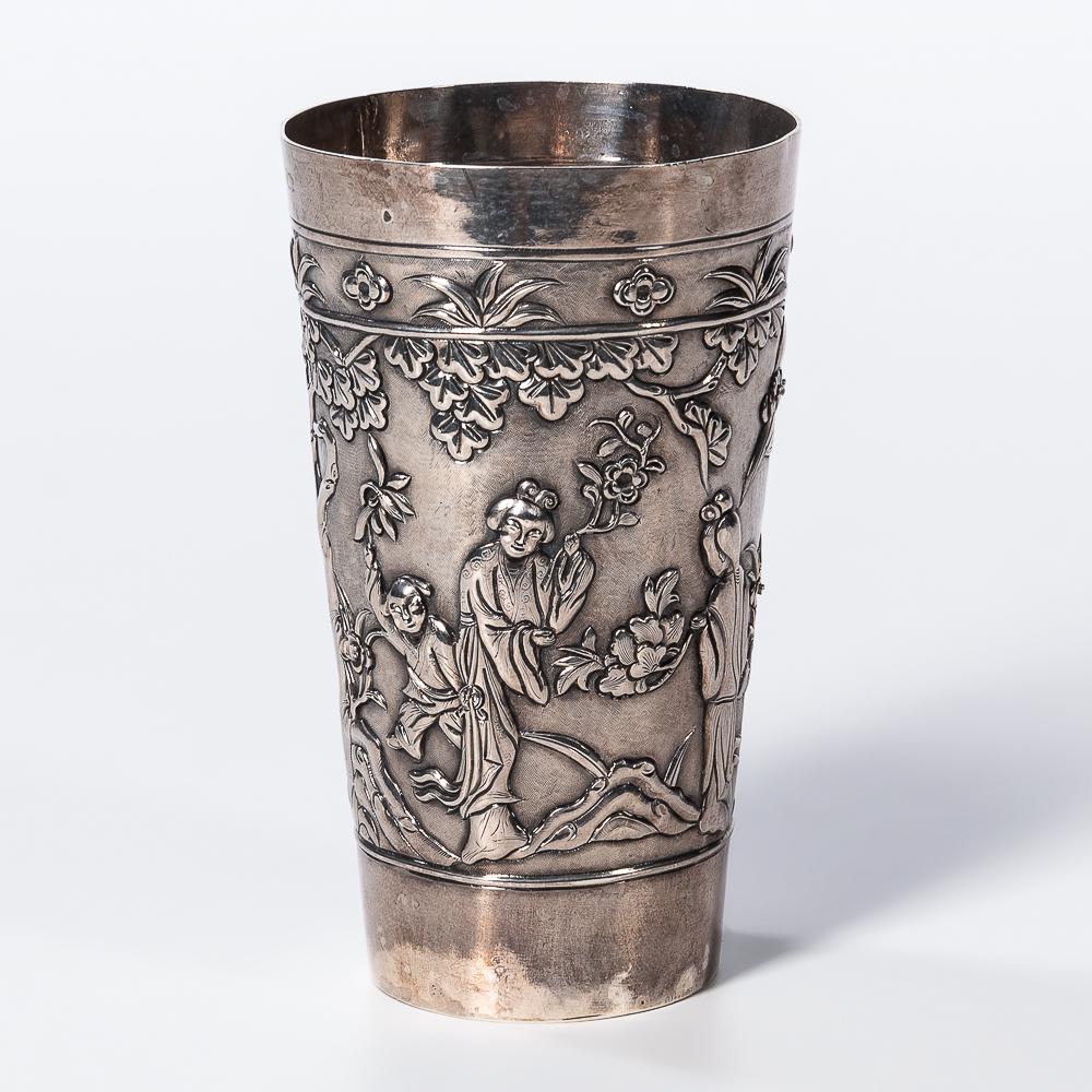 Chinese Export Silver Beaker, 19th century, with deeply repousse and chased figures and trees, the (1 of 2)