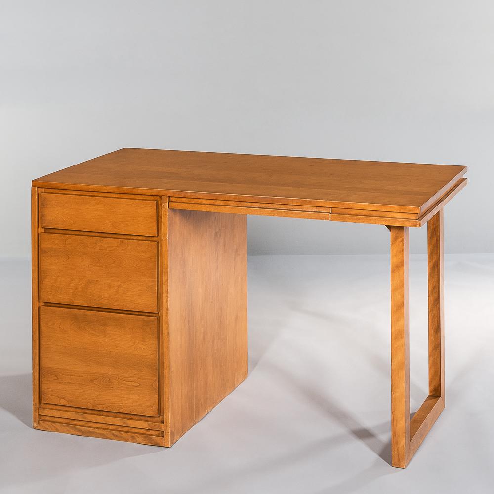 Russel Wright (1904-1976) for Conant Ball Desk, Gardner, Massachusetts, center pen drawer, three: Russel Wright (1904-1976) for Conant Ball Desk, Gardner, Massachusetts, center pen drawer, three side drawers, the bottom one partitioned for files, branded marker's mark, ht. 30 in. (76 cm), wd. 48 i