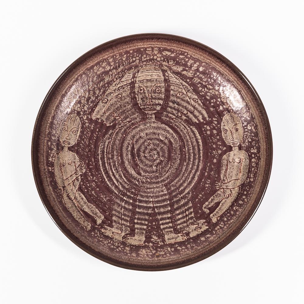 Edwin and Mary Scheier Studio Pottery Platter, New Hampshire, decorated with human and animal: Edwin and Mary Scheier Studio Pottery Platter, New Hampshire, decorated with human and animal figures, signed, dia. 15 3/4 in. (40 cm).