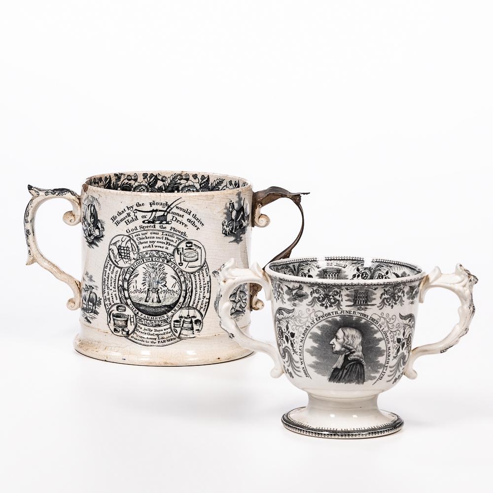 Two Staffordshire Transfer Decorated Loving Cups, England, mid-19th century, the largest with: Two Staffordshire Transfer Decorated Loving Cups, England, mid-19th century, the largest with make-do handle repair decorated with the Farmer's Arms; the smaller celebrating John Wesley, ht. to 6 3/4
