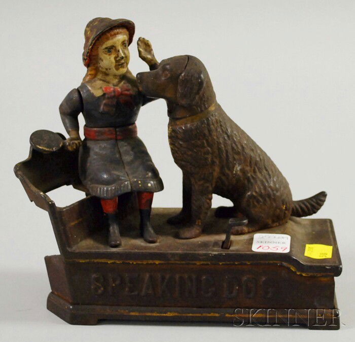 J. & E. Stevens Painted Cast Iron "Speaking Dog": J. & E. Stevens Painted Cast Iron "Speaking Dog" Mechanical Bank, base impressed "PAT JULY 14 1885 AND OCT 20 1885," (paint loss and end panel loss), lg. 8 in.