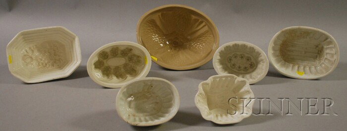 Seven Ceramic Culinary Molds, including sheaf of : Seven Ceramic Culinary Molds, including sheaf of wheat, an eagle, fruit, three designs, and asparagus.