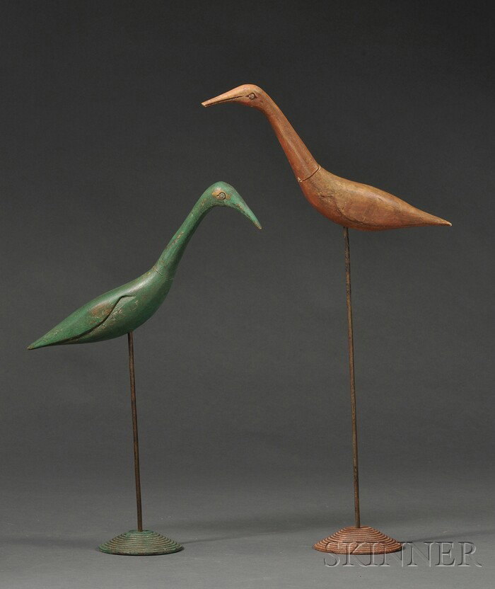 Two Carved and Painted Shorebird Figures, America,: Two Carved and Painted Shorebird Figures, America, early 20th century, the figures with small nail/washer eyes, incised bills and wing details, supported on iron rods and turned wood bases, one red an
