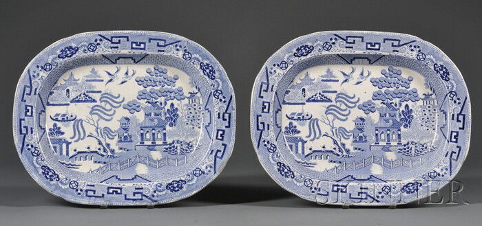 Pair of Blue and White Staffordshire Blue Willow P: Pair of Blue and White Staffordshire Blue Willow Pattern Platters, England, early 19th century, oblong pearlware platters, (minor chip on one), 17 1/2 x 14 in.