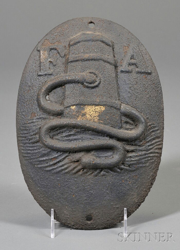 Cast Iron Fire Association of Philadelphia Fire Ma: Cast Iron Fire Association of Philadelphia Fire Mark, c. 1860-70, deep convex oval with "F A" over fire hydrant and hose issuing water in relief, painted black over earlier gilt, (rust, two small loss