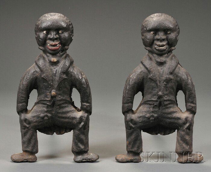 Cast Iron Figural Andirons, America, late 19th/ear: Cast Iron Figural Andirons, America, late 19th/early 20th century, cast in the form of a black man wearing a waistcoat with tails, squatting with hands on knees, the billet bar with raised maker's mar