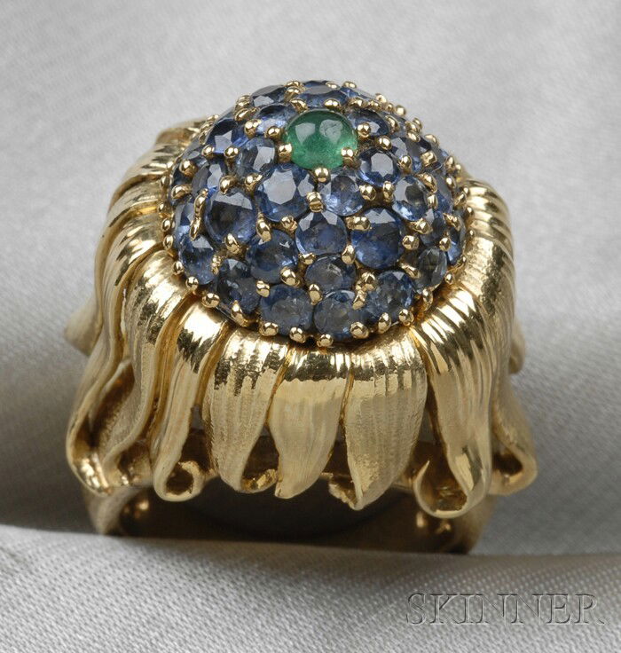 18kt Gold "Thistle" Ring, Schlumberger, Tiffany &: 18kt Gold "Thistle" Ring, Schlumberger, Tiffany & Co., the domed form set with circular-cut sapphires, cabochon emerald accent, size 7 1/2, signed.