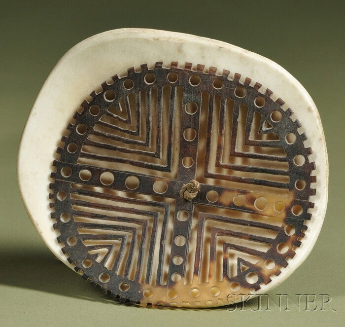 New Guinea Carved Shell Ornament, Kapkap, c. first: New Guinea Carved Shell Ornament, Kapkap, c. first half 20th century, white shell overlaid with another shell with elaborate geometric cutout design, dia. 4 in.