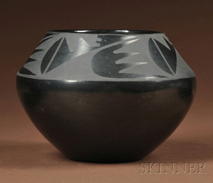 Southwest Black-on-Black Pottery Bowl, San Ildefon: Southwest Black-on-Black Pottery Bowl, San Ildefonso, Marie, the tapered neck with abstract bear paw (?) design, ht. 4 1/2, dia. 6 1/4 in. Provenance: Chester College of New England.