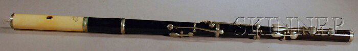 Multi-keyed Flute, After H.F. Meyer, c. 1920, stamp: Multi-keyed Flute, After H.F. Meyer, c. 1920, stamped NACH, HF MEYER, HANNOVER, the ivory head joint, the ebony body, length 26 in.