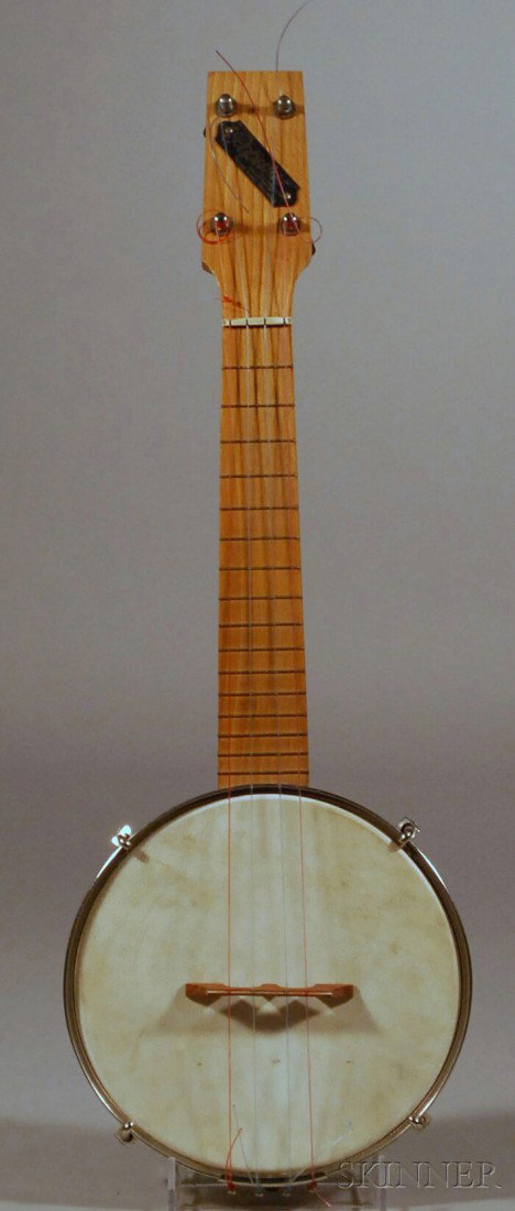English Banjo-Uke, c. 1925, labeled THE WINDSOR, PO: English Banjo-Uke, c. 1925, labeled THE WINDSOR, POPULAR, AO WINDSOR MAKER, etc., diameter of head 6 5/8 in., with case.