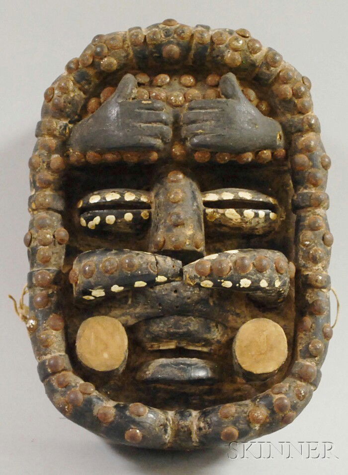 Bete Carved Wood Mask, with metal tacks.: Bete Carved Wood Mask, with metal tacks.