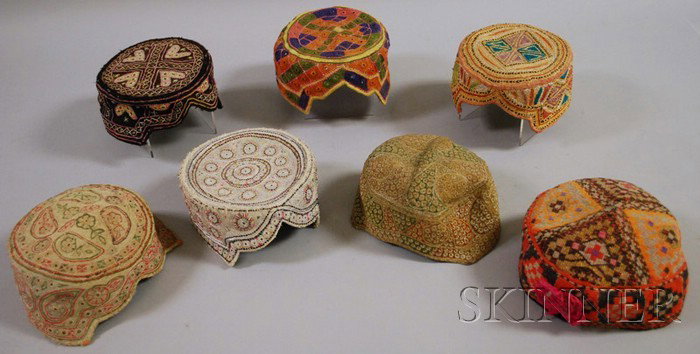 Seven Woven and Decorated Central Asian Caps.: Seven Woven and Decorated Central Asian Caps.