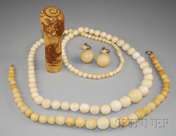 Small Group of Ivory Jewelry and Accessory Items,: Small Group of Ivory Jewelry and Accessory Items, two beaded necklaces and a Japanese cane handle carved with a scene of monkeys, together with a pair of plastic earrings.