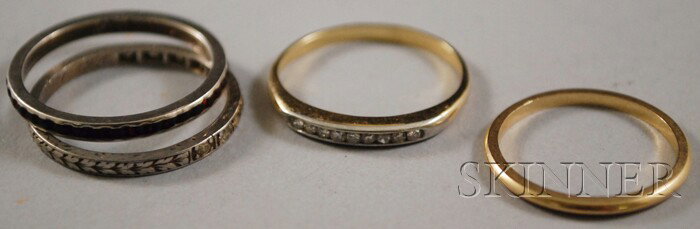 Three Thin 14kt Gold Bands, two with diamonds and: Three Thin 14kt Gold Bands, two with diamonds and one plain gold, together with a sterling silver and paste eternity band.