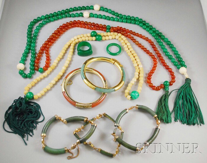 Small Group of Asian Jewelry, including hardstone : Small Group of Asian Jewelry, including hardstone beaded necklaces, a jade band, a jade saddle ring, and a number of jadeite bracelets.
