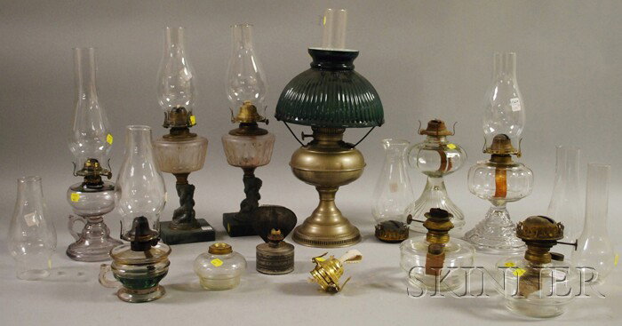 Eleven Assorted Kerosene Table Lamps, including a: Eleven Assorted Kerosene Table Lamps, including a Rayo nickel-plated with cased green glass shade, eight pressed glass, tin, etc.