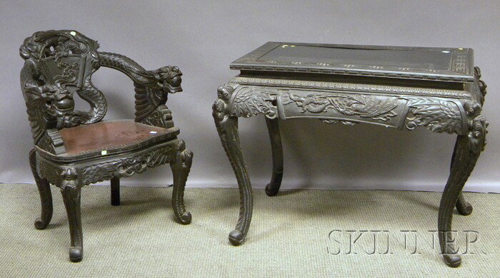 Asian Export Ebonized Carved Wood Table and Armch: Asian Export Ebonized Carved Wood Table and Armchair.