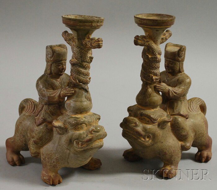 Pair of Chinese Glazed Redware Figural Candlehold: Pair of Chinese Glazed Redware Figural Candleholders, ht. 10 in.
