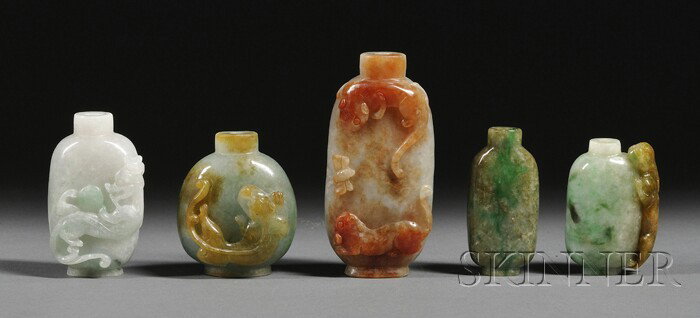 Five Jadeite Snuff Bottles, pale green with apple : Five Jadeite Snuff Bottles, pale green with apple green markings to brown in color, each ht. approx. 2 in.