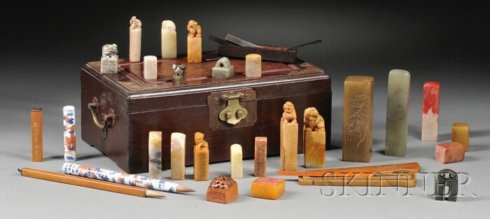 Rosewood Stationery Box, China, 19th century, surf: Rosewood Stationery Box, China, 19th century, surface inset with burlwood plaques and with engraved copper mounts, interior includes twenty-three soapstone, jade, and bamboo seals, a boxed group of ho