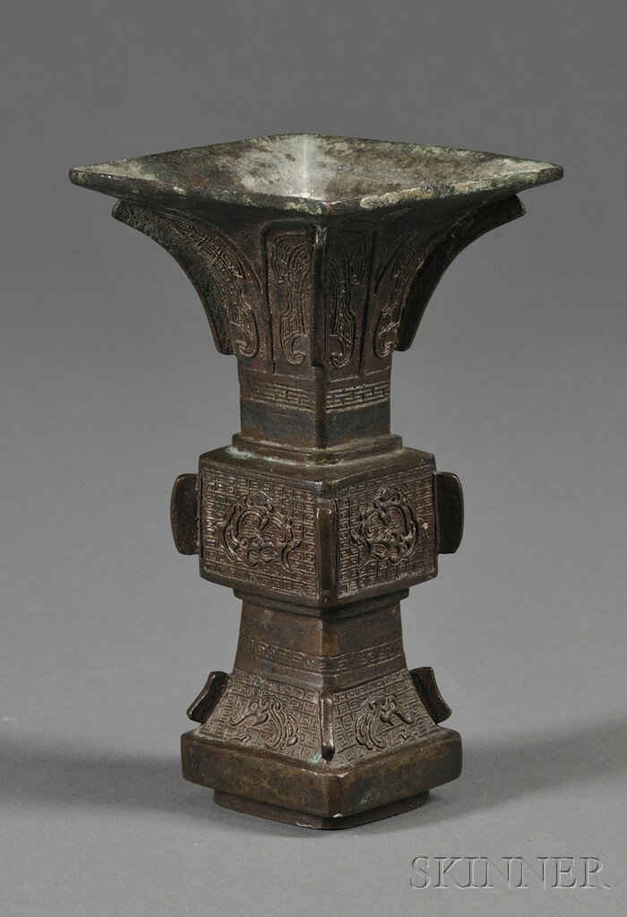 Ritual Bronze Vessel, China, 19th century, fang k: Ritual Bronze Vessel, China, 19th century, fang ku form, surface decorated with flanges and cicada and thunder meander motifs, ht. 6 in.