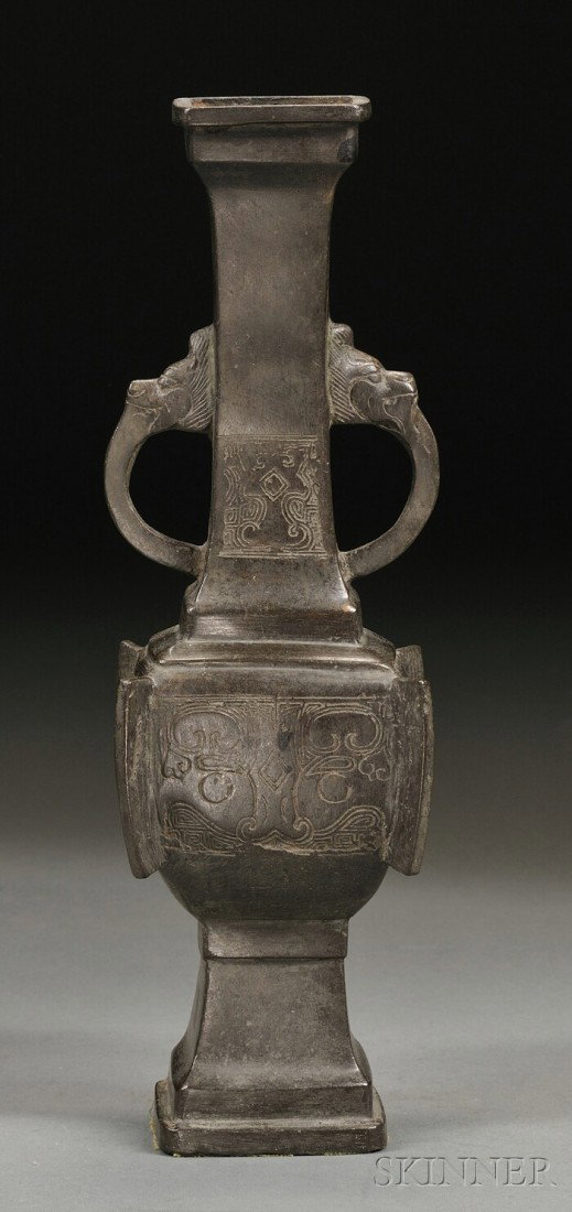Bronze Vase, China, 19th century or earlier, arch: Bronze Vase, China, 19th century or earlier, archaic ritual vessel fang ku with flanges and dragon mask handles, ht. 11 in.