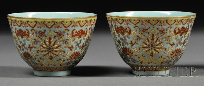 Pair of Porcelain Cups, China, 19th century, turq: Pair of Porcelain Cups, China, 19th century, turquoise ground with enameled designs of stylized lotus scrolls, bats and wan characters in red, yellow, blue, and chartreuse with gilt, dia. 3 1/2 in.