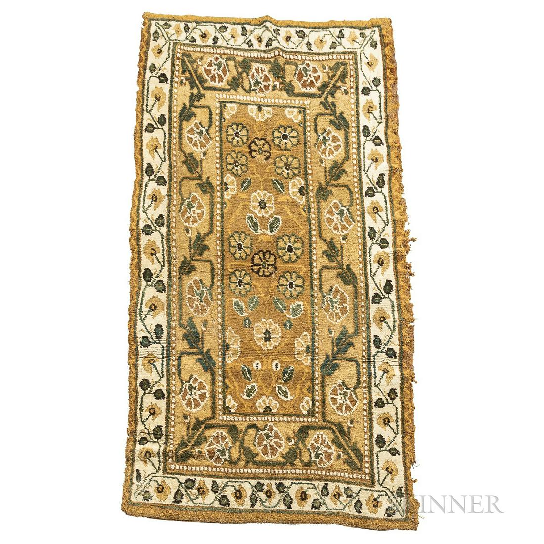 Deccan Rug India 3 ft. 7 in. x 6 ft. 9 in.: Deccan Rug India c. mid 19th century, The camel-colored field with a rosette pattern within multiple borders of meandering vine motifs. 3 ft. 7 in. x 6 ft. 9 in.