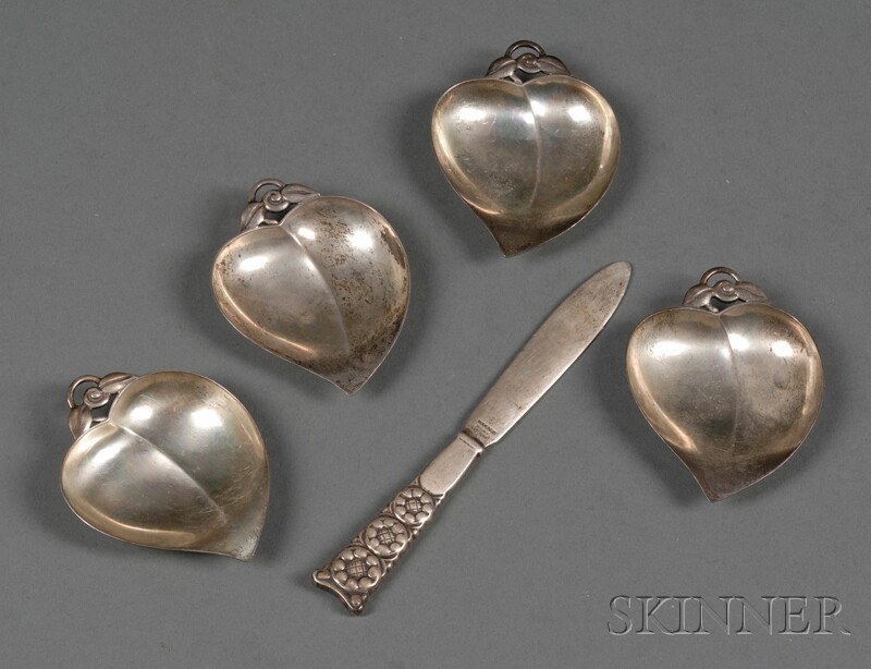 Five Small Sterling Modernist Tableware Items, a G: Five Small Sterling Modernist Tableware Items, a Georg Jensen "Dahlia" pattern paper knife, lg. 6, and set of four Tiffany & Co. heart-shaped butter pats, lg. 3 1/4 in., approx. 6 troy oz.