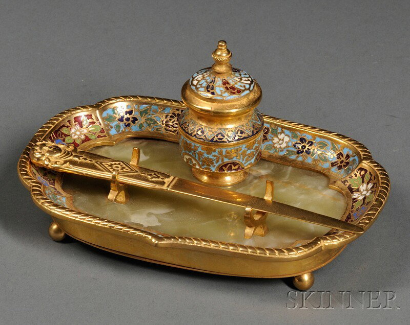 Onyx and Champleve Decorated Ormolu Inkstand, Fran: Onyx and Champleve Decorated Ormolu Inkstand, France, 19th century, the central inkwell with hinged lid and glass liner, with pen-rest, on ball feet, lg. 6 7/8 in.; together with an ormolu letter open