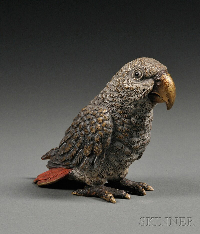 Austrian Cold-painted Bronze Parrot, the standing: Austrian Cold-painted Bronze Parrot, the standing bird in shades of gray with red tail feathers, ht. 3 1/2 in.