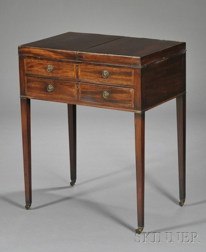 Crossbanded Dressing Table, England, late 18th/ear: Crossbanded Dressing Table, England, late 18th/early 19th century, the hinged rectangular top opening to reveal interior fitted with adjustable looking glass, and lidded and open compartments, front w