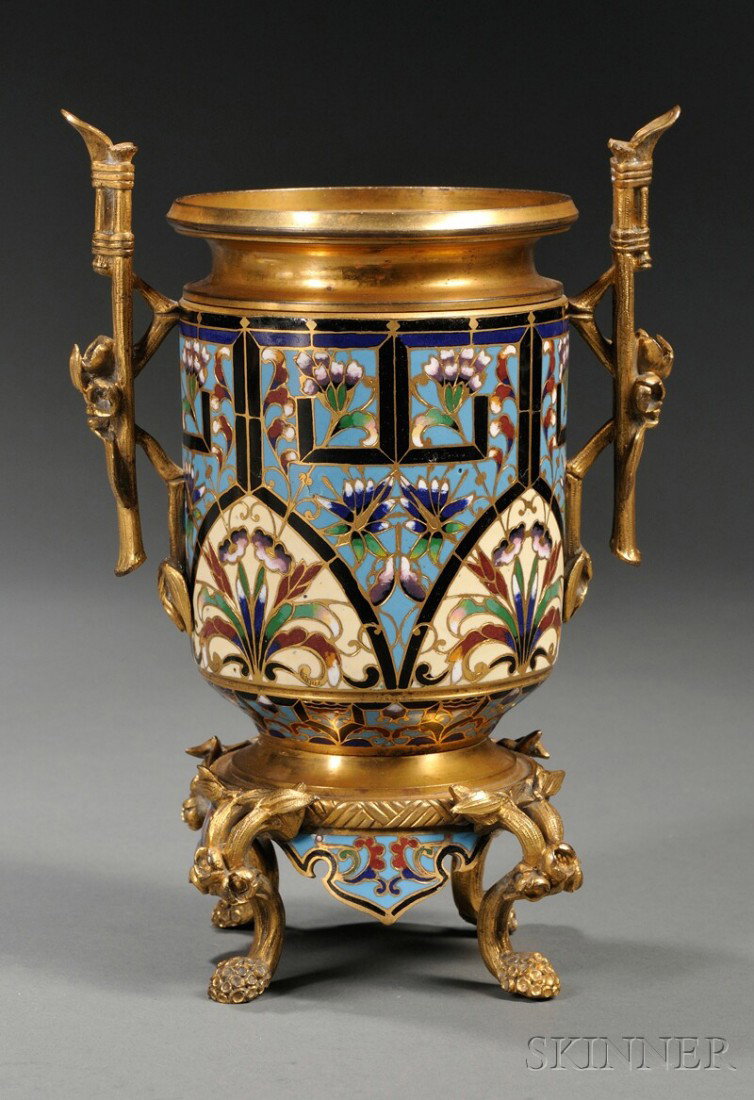 Bronze Urn with Champleve Decoration, France, 19th: Bronze Urn with Champleve Decoration, France, 19th century, with floral enamel decoration, two bamboo-form handles, and on base with foliate C-scroll feet, ht. 8 in.