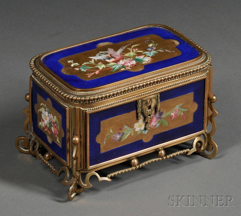 Old Paris Porcelain and Bronze Box, 19th century, : Old Paris Porcelain and Bronze Box, 19th century, the body with blue ground and hinged lid with central gilded cartouche depicting a bird and branches, sides with further flower-filled gilded cartouch