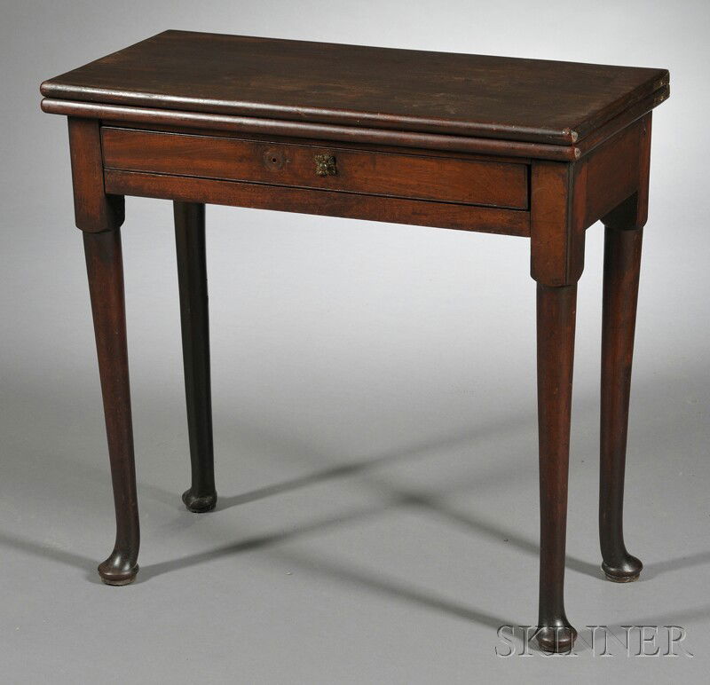 Queen Anne Mahogany Gate-leg Game Table, England,: Queen Anne Mahogany Gate-leg Game Table, England, early 18th century, the hinged rectangular top over frieze drawer and square stiles, on circular tapered legs ending in raised pad feet, ht. 28 1/2, w