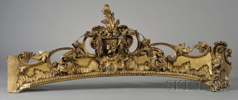 Four Large Carved Giltwood Curtain Rods, 19th/ear: Four Large Carved Giltwood Curtain Rods, 19th/early 20th century, each with central basket containing scrolling and trailing foliage, two approx. wd. 70, two approx. wd. 100 in.