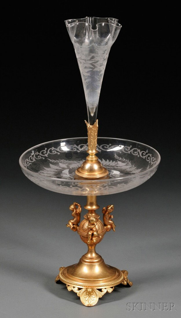 Dore Bronze and Glass Center Bowl/Epergne, France: Dore Bronze and Glass Center Bowl/Epergne, France, 19th century, foliate-etched trumpet-shaped vase and bowl, cherub mounts to globular shaped stem of base, overall ht. 18 1/2 in.