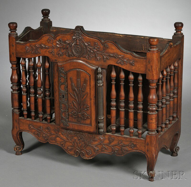 Louis XV-style Panetiere, the front with shaped a: Louis XV-style Panetiere, the front with shaped and crest monogrammed "B" within a wreath flanked by garlands, over door with wheat sheaf and pewter escutcheon and hinge, surrounded by baluster stiles
