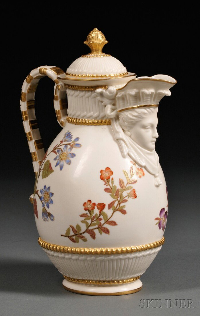 Royal Worcester Porcelain Covered Hot Water Jug, : Royal Worcester Porcelain Covered Hot Water Jug, England, c. 1887, ovoid shape with molded female mask below the spout, ivory ground with gilded trim and polychrome floral decoration, printed mark, ht