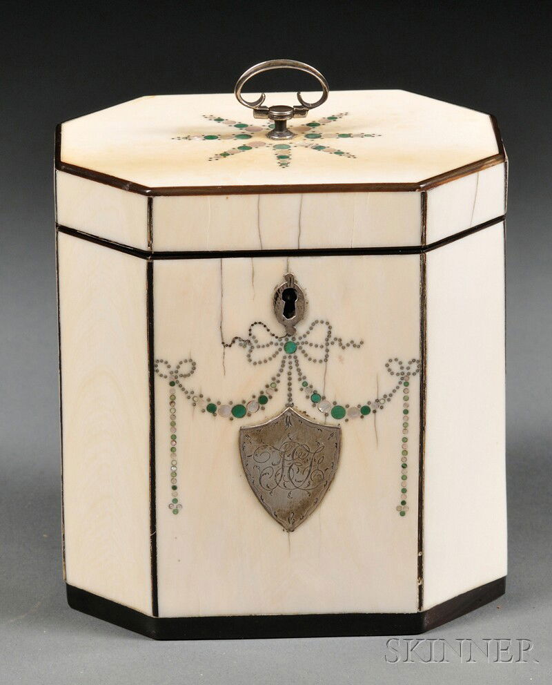 Octagonal Ivory Tea Caddy, England, late 18th cen: Octagonal Ivory Tea Caddy, England, late 18th century, trimmed with tortoiseshell and with a silver knob and monogrammed shield-shaped cartouche, green shell, mother-of pearl and silver pique work to