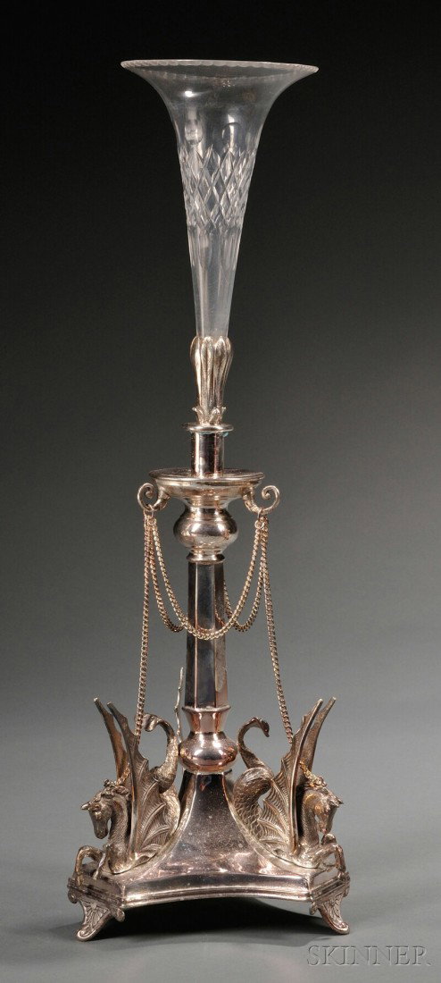 Cut Glass and Silver-plate Epergne, 20th century,: Cut Glass and Silver-plate Epergne, 20th century, the cross-hatched trumpet-shaped vase inset into a raised triangular base set with winged horses to each corner, overall ht. 20 in.