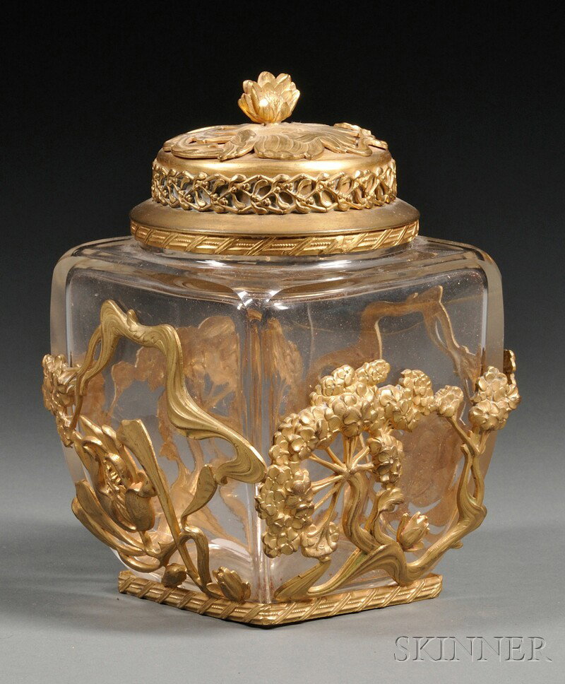 Art Nouveau Ormolu Mounted Glass Jar, the peaked: Art Nouveau Ormolu Mounted Glass Jar, the peaked lid with floriform overlay, over square tapered body further overlaid with a sinuous motif of hydrangeas and tulips, ht. 7 5/8 in.