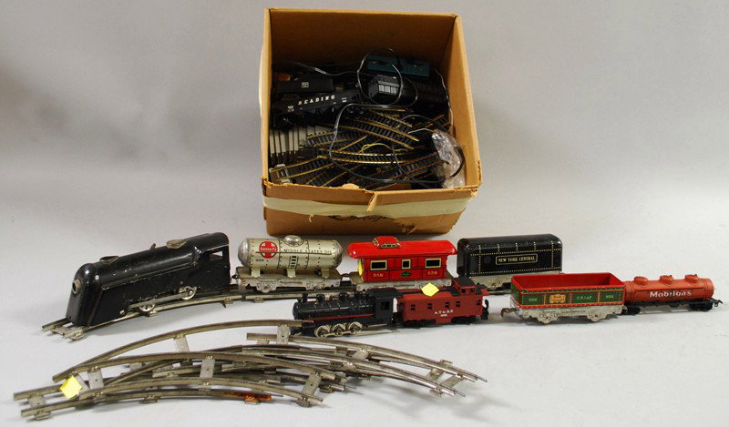 Group of Toy Trains and Track, different sizes and : Group of Toy Trains and Track, different sizes and materials.