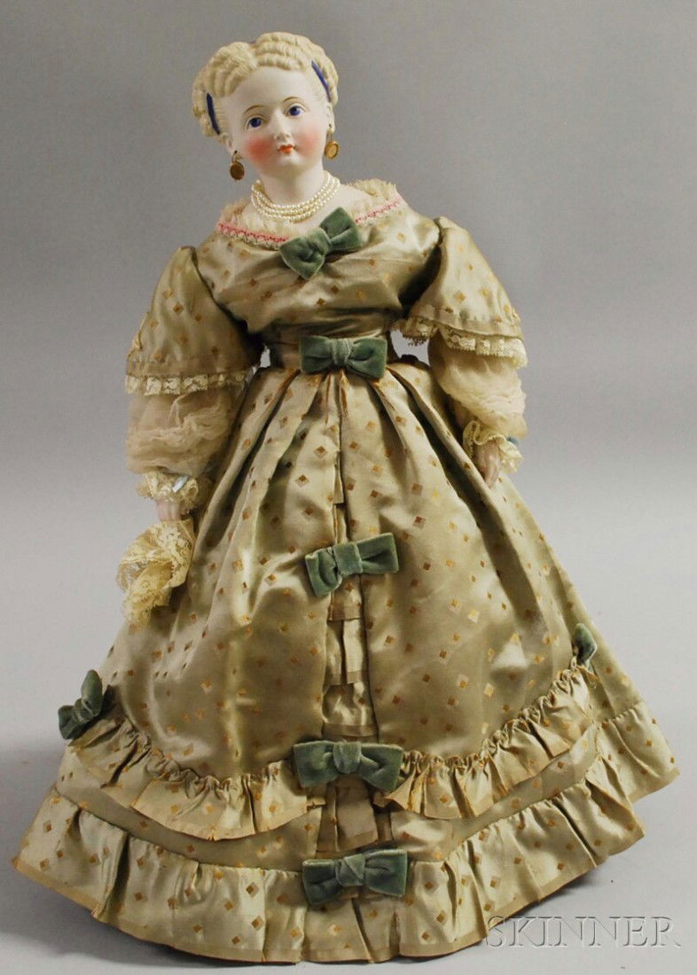Parian Lady Doll with Elaborate Hairstyle, Germany: Parian Lady Doll with Elaborate Hairstyle, Germany, c. 1870, pierced ears, cloth body, stitched-on boots, china hands, ht. 20 in. (small chip to hair).