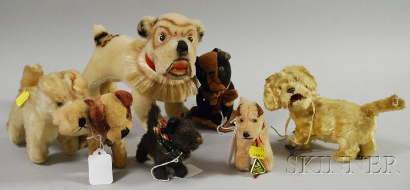 Seven Miscellaneous Toy Dogs, mostly Germany, a St: Seven Miscellaneous Toy Dogs, mostly Germany, a Steiff Bully, Hermann terrier, etc., lg. 4-9 in.
