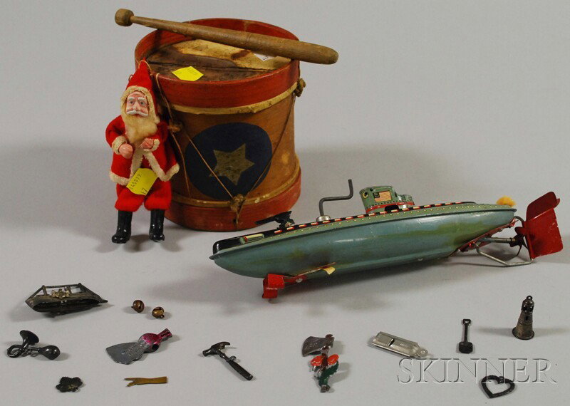 Group of Toys, Japanese submarine, Santa, small me: Group of Toys, Japanese submarine, Santa, small metal toys and drum, the early wooden drum with note of original ownership.