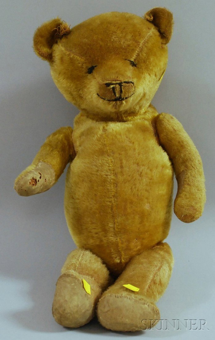 Gold Mohair Teddy Bear, early 20th century, disc-a: Gold Mohair Teddy Bear, early 20th century, disc-articulated arms and legs, ht. 23 in.